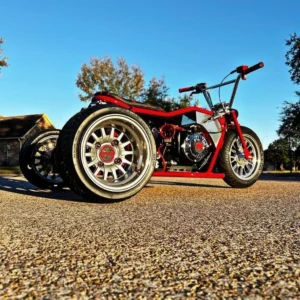 Flash red pro street drift trike front three-quarter view